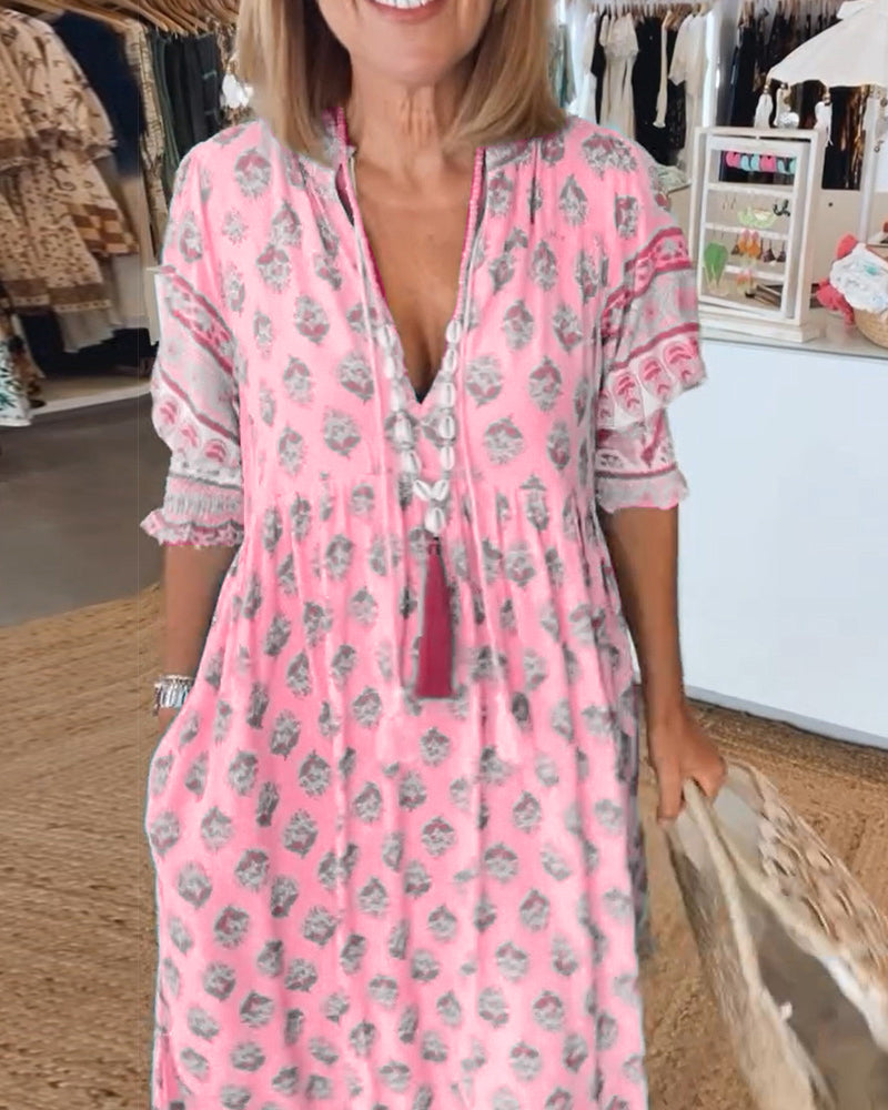 Verona | Stylish dresses with V-neckline and elegant pattern
