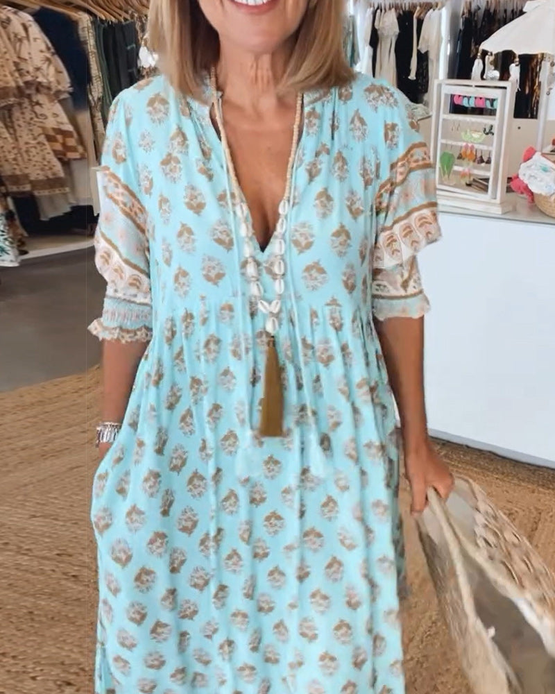 Verona | Stylish dresses with V-neckline and elegant pattern
