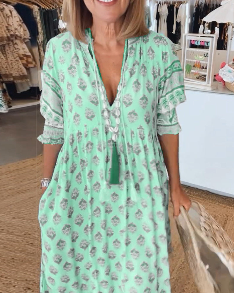 Verona | Stylish dresses with V-neckline and elegant pattern