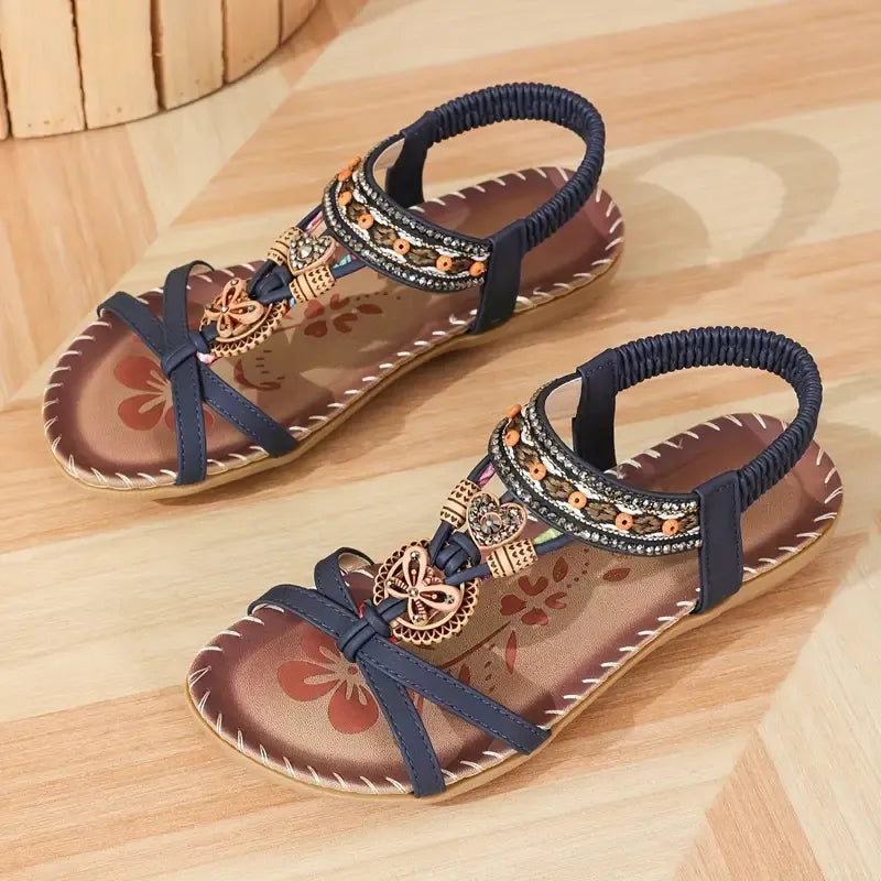 Clara | Elegant sandals decorated with flowers and a rhinestone butterfly