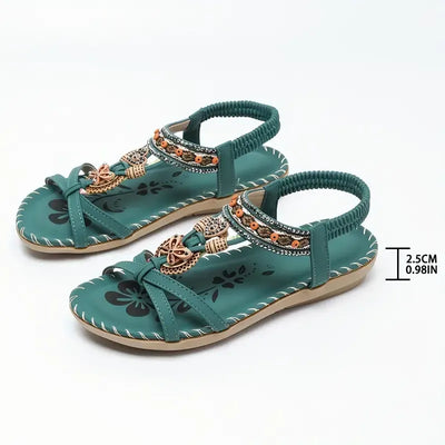 Clara | Elegant sandals decorated with flowers and a rhinestone butterfly