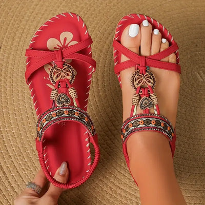 Clara | Elegant sandals decorated with flowers and a rhinestone butterfly