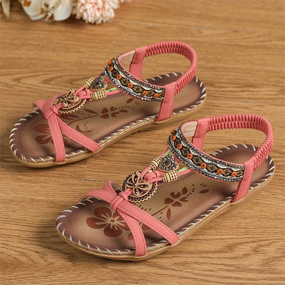 Clara | Elegant sandals decorated with flowers and a rhinestone butterfly