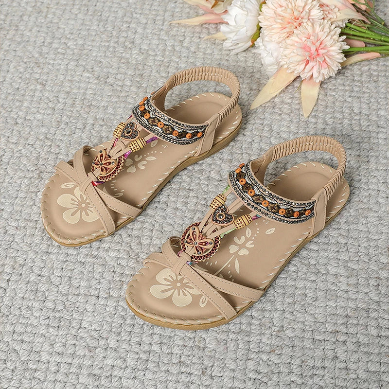 Clara | Elegant sandals decorated with flowers and a rhinestone butterfly