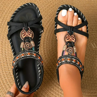 Clara | Elegant sandals decorated with flowers and a rhinestone butterfly